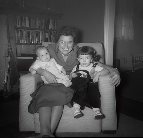 My Aunt Elsie holding me and older sister Carol
