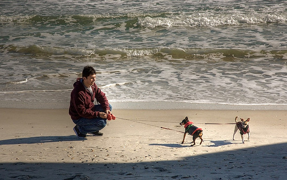 James and dogs on Wrightsville Beach